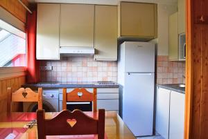 Résidence Cherferie - Studio aux pieds des pistes aux Menuires MAE-3924