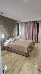 Appartement de prestige à Dar bouazza avec plusieurs piscines et à proximité à la plage