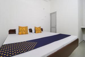Hotel O MCK Rooms