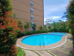 Near Airport Studio deluxe with kitchen, balcony and swimming pool Puerto Prinsesa , Palawan