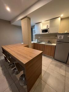 Depto vista directa al mar con Piscina climatizada