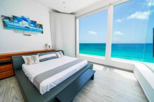 Penth House Nizuc frente al mar con alberca privada 16 Huespedes