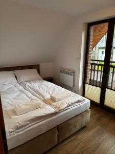 Ceglana Przystań - Apartamenty i Domek Pogorzelica