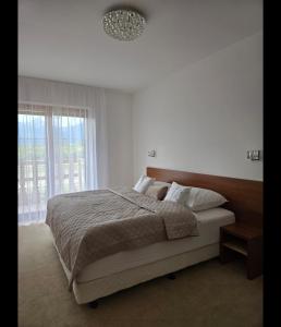 Výhľadový apartmán Golf s garážovým státim