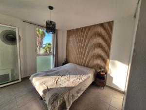 Le Grand Large T2 climatisé à 200 m plage, parking