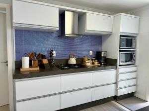 Apto alto padrão na Praia de Torres - 550m do mar