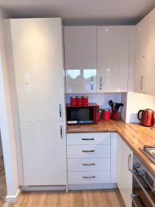 Modern Home with Private Garden and Car Park in Manchester