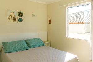 Quarto aconchegante privativo a 150m da praia