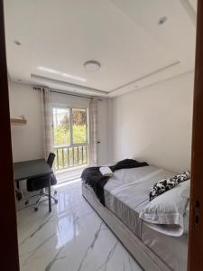 appartement coquette face à la forêt proche chu aéroport bas prix