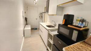 Condo in San Fernando Azure North with Home Theater