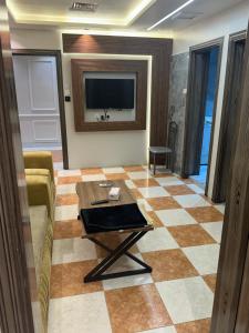 الأوائل الذهبية للشقق المخدومة فئة اقتصادي