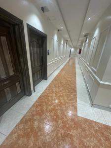 الأوائل الذهبية للشقق المخدومة فئة اقتصادي