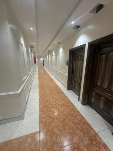 الأوائل الذهبية للشقق المخدومة فئة اقتصادي