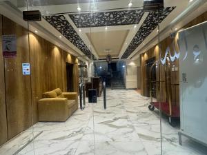 الأوائل الذهبية للشقق المخدومة فئة اقتصادي