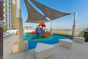 Stylish 1BR with Pool Gym and Parking in Riviera 12
