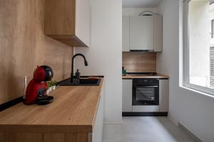 Rossini King bed i BR Apartment