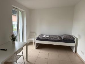 Modernes 2-Zimmer Apartment mit 4 Einzelbetten, Küche & Balkon