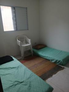 Apartamento na praia 2 qt com quintal e churrasqueira