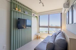 Apartamento com VISTA maravilhosa no bairro do Pina! Cozinha completa, Wi-Fi, Ar Condicionado e máquina de lavar - Condomínio com Estacionamento, Recepção 24h, Piscina e Academia