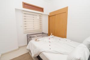 Iris Plage - 2 Chambres Cosy - Malabata, Face mer, Tout à proximité, Playstation - WIFI, AC, IPTV