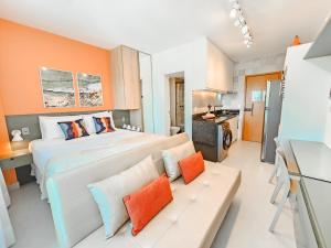 Flat Porto de Galinhas Muro Alto 300m praia, familias, lavadora de roupas, enxoval, wi fi 300mbps, cozinha completa, piscinas, varanda, recepcao 24hrs, estacionamento, parquinho, campo