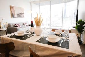 Tranquil River-View 2-Bedroom High-Rise Apartment