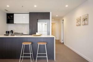 Tranquil River-View 2-Bedroom High-Rise Apartment