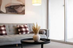 Tranquil River-View 2-Bedroom High-Rise Apartment