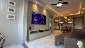 Apê central BC | 450m da praia + AC + vaga