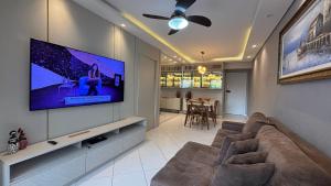 Apê central BC | 450m da praia + AC + vaga