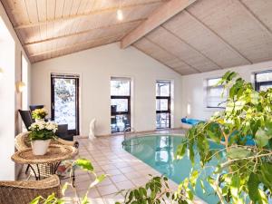 12 person holiday home in Pandrup-By Traum