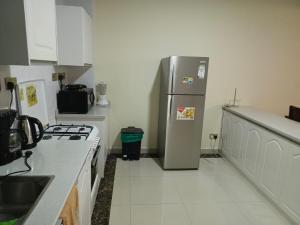 Smart elegant three bedroom apartment with fully equipped gym child play area proximity to shopping malls and great breathtaking city views