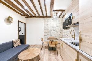 Palais Royal - Victoires 1bdr by BYour Home