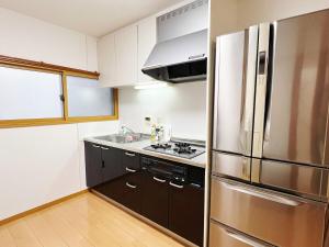 Osaka Enso無料駐車場ありUSJまで15分難波へ15分電車直通