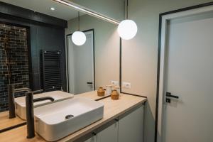 New Unirii Center Apartments by Olala Homes