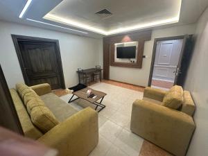 الأوائل الذهبية للشقق المخدومة فئة اقتصادي