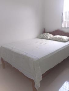 Casa em itanhaem com piscina, churrasqueira a poucos minutos da praia