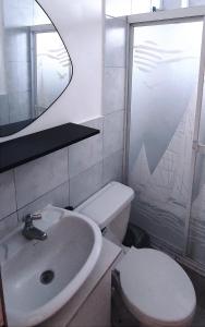 Habitaciones en casa de Mari en Manta