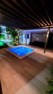 Casa com Piscina Jacuzi e Salão de Jogos