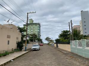 Casa com Piscina à 130m da praia do gravata