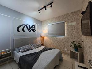 Vista Praia Mar - 2 dormts - com AR condicionado na Suíte - Sala de Estar e Jantar com cozinha integrada - 250 m da praia da Aviação - WI FI - Varanda Gourmet com Churrasqueira e ESTACIONAMENTO gratuito