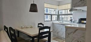 Homes by Gilmore Tower Suites