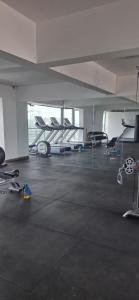 elegant executive fully furnished three bedroom apartment with ample parking space, swimming pool fully equipped gym children playing ground and amazing city views