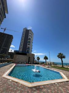 Гонио Апартамент с отдельной спальней