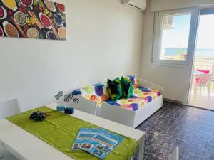 Beachfront flat with view