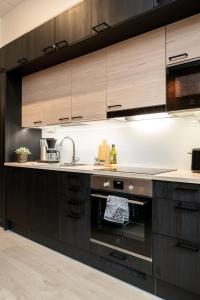 City Home Alvari, ilmainen pysäköinti lämpimässä autohallissa, free parking in warm garage