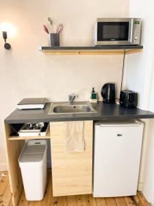 Le Sablésien 4 personnes,salon et cuisine entre centre ville et gare