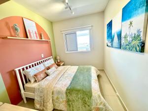 Apto decorado no centro com ar condicionado, piscina, churrasqueira à 5 minutos de caminhada da praia