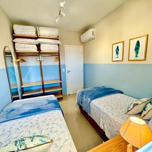 Apto decorado no centro com ar condicionado, piscina, churrasqueira à 5 minutos de caminhada da praia