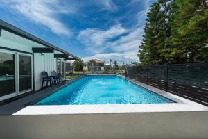 Curlew Beach Cottage by Sun Palace Vacations